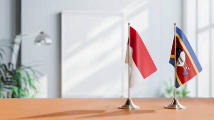 FLAGS OF INDONESIA And SWAZILAND ON TABLE