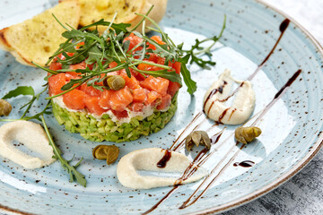 salmon tartare with avocado and lemon