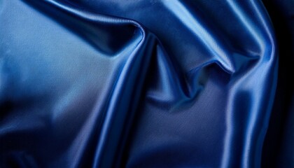 Obraz premium 濃い青のサテン生地、シルクの光沢感と深みが織りなす優雅なテクスチャ 