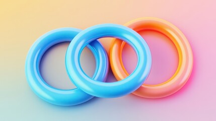 Three colorful rings in blue, pink, and orange create a vibrant and playful composition against a soft gradient background.