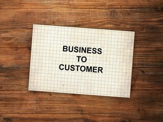 A black and white sign that says  business to customer