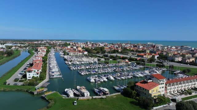 Darsena dell'Orologio in Caorle, modern motorboat, yacht, storage, and rental in Metropolitan City of Venice, Italy