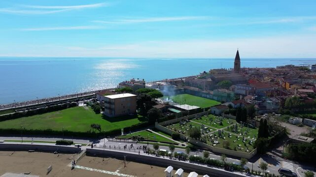 Adriatic Sea, Duomo di Santo Stefano Protomartire, beach near Madonna Angelo Church in Caorle, Italy