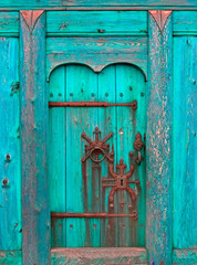 Rusty old Door bolt on an old door	