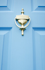 USA, New Jersey, Mendham, Close-up of blue front door with brass door knocker