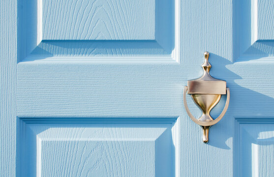 USA, New Jersey, Mendham, Close-up of blue front door with brass door knocker