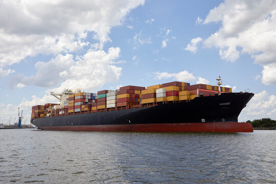 Cargo ship with containers at dock