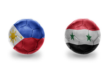 Obraz premium football balls with national flags of syria and philippines ,soccer teams. on the white background.