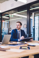Group of men in business suit working in office