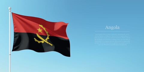 Waving Flag of Angola Against Clear Blue Sky Copyspace