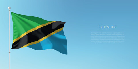 Waving Flag of Tanzania Against Clear Blue Sky Copyspace