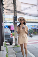 Fototapeta premium A woman wearing a straw hat