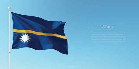Waving Flag of Nauru Against Clear Blue Sky Copyspace