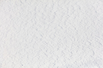A white background with a few small white lines