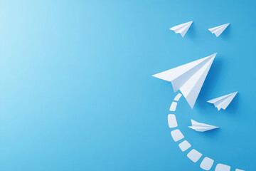 A blue background with a white paper airplane flying through the air