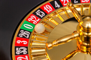The roulette wheel spins in the casino