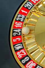 The roulette wheel spins in the casino