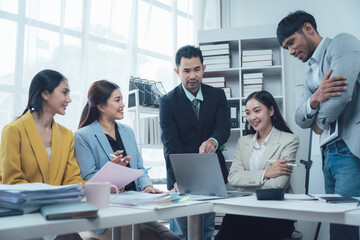 Business Meeting:  A group of professionals discuss ideas and strategies in a modern office setting, fostering collaboration and innovation, showcasing the dynamic nature of teamwork.  