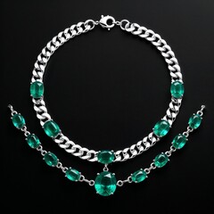Polished silver chain with emerald stones rich green accents on plain black dark background