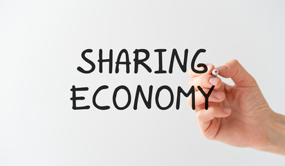 Hand writing text Sharing Economy. Conceptual photo