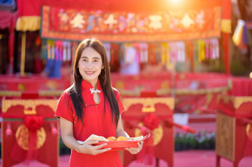 Vibrant Woman Celebrating Festival with Traditional Offering