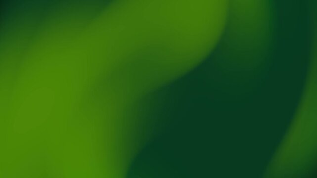Blurred green background with various shades. Suitable for naturethemed designs, environmental concepts, or abstract backgrounds in design projects.
