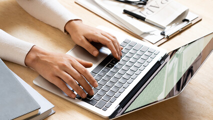 fingers typing blank white screen laptop. for mockup business