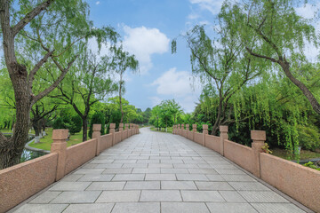 Empty brick floor and woods landscape in the park