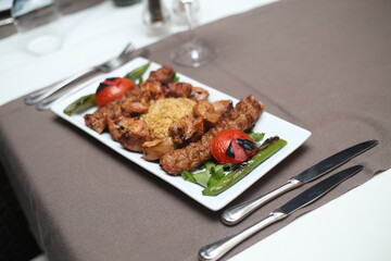 Traditional Turkish Mixed Grill Platter with Chicken, Beef, and Vegetables