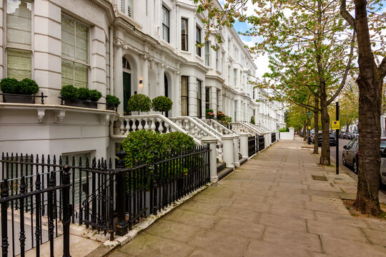 White residential townhouses in Kensington, London, UK