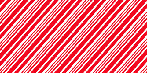 Candy cane seamless pattern. Christmas striped red background. Xmas prints with diagonal lines. Cute holiday wrapping paper. Abstract geometric texture. Vector illustration.