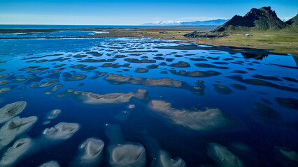 Beautiful Tidal Flats with Glacier Mountains in the Distance