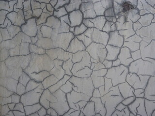A photography grey cracked concrete wall texture background