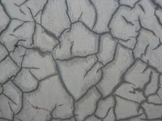 A photography grey cracked concrete wall texture background