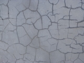 A photography grey cracked concrete wall texture background