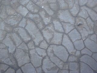 A photography grey cracked concrete wall texture background