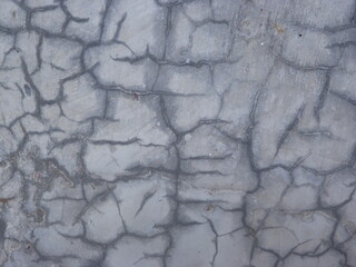 A photography grey cracked concrete wall texture background