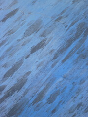 Abstract Grunge blue wall background, texture of blue decorative plaster or concrete.