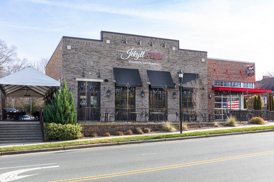 MATTHEWS, NC, USA-15 JANUARY 2023: Jekyll & Hyde TapHouse and Grill, building and signs.  Trade Street.