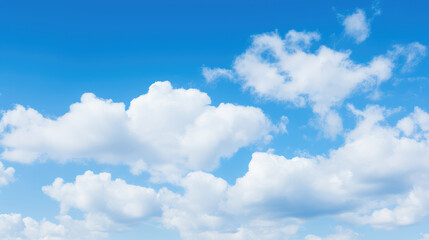Fototapeta premium Serene Blue Sky with Fluffy Clouds