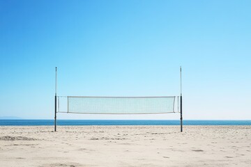 Empty beach volleyball court with clear blue sky