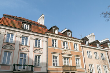 Obraz premium Beautiful building facades. Architecture details. the historical city center. Old Town, Warsaw.