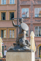 Syrenka statue on Old Town Market square in Warsaw, Poland. The Mermaid of Warsaw. © bykot