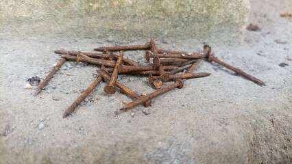 old rusty, 16 penny nails, pile of heavy penny nails for construction and carpentry, building, creating, antique, old, grandfathers building tools