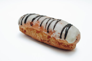 Eclairs glazed. Chocolate eclairs isolated on white background