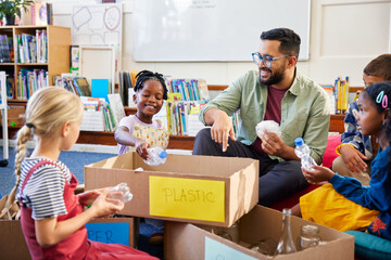 Students organizing classroom waste with teacher
