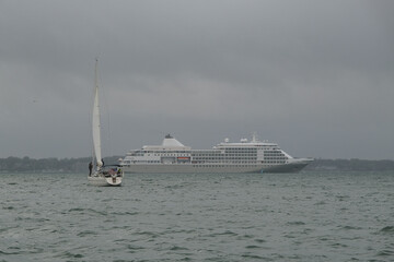 Ultra luxury all inclusive deluxe cruiseship cruise ship yacht liner Whisper or Shadow anchoring in...