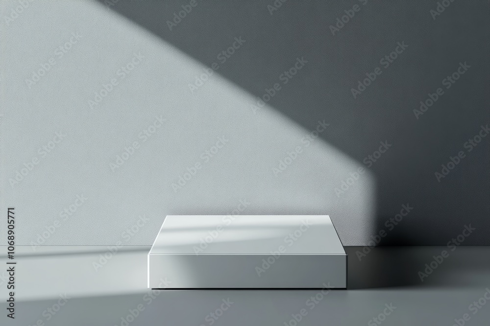 Poster White podium mockup on a minimalist grey background with a diagonal shadow. Perfect for product displays, branding, and design presentations.