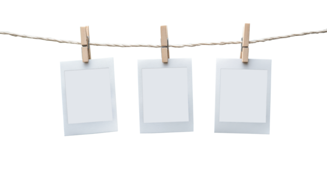 Blank paper photo frames hanging on rope isolated on transparent background. Generative AI