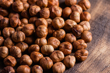 Raw, unshelled hazelnuts close-up. Hazelnut